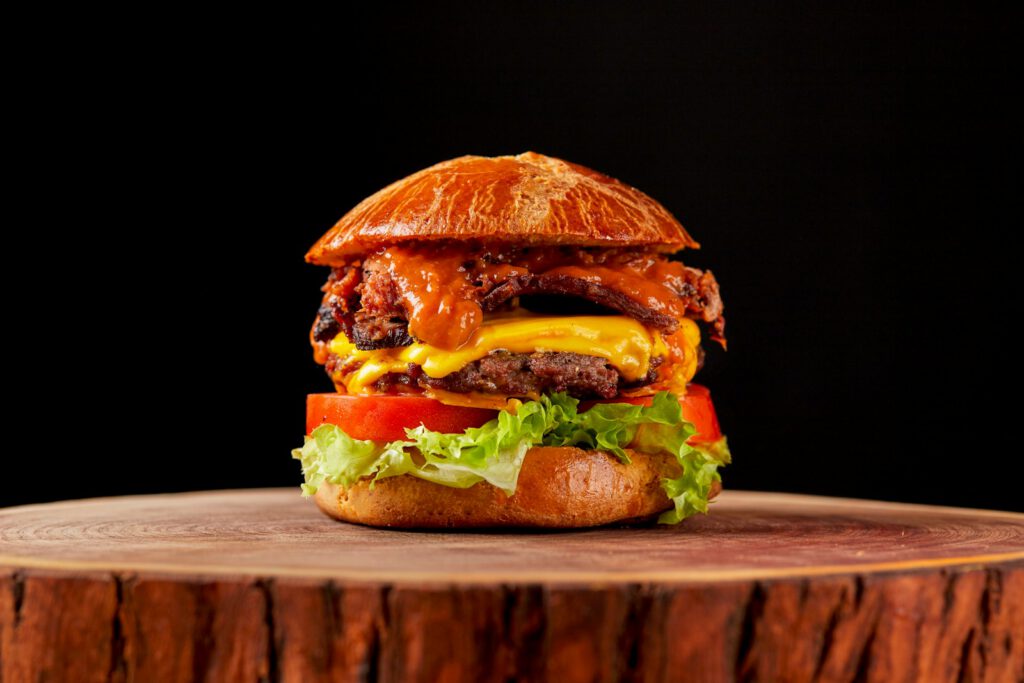 burger on brown wooden table